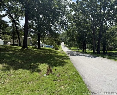 Great building lot in Warsaw! Nice big, shaded corner lot, just - photo 6