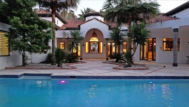 Set on one of Coral Gables finest tree-lined streets, this - photo 4