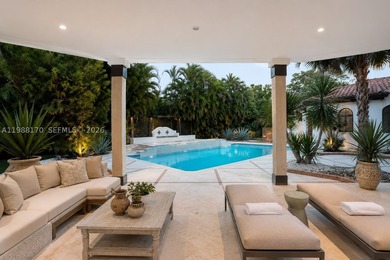 Set on one of Coral Gables finest tree-lined streets, this - photo 7