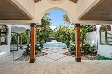 Set on one of Coral Gables finest tree-lined streets, this - photo 8