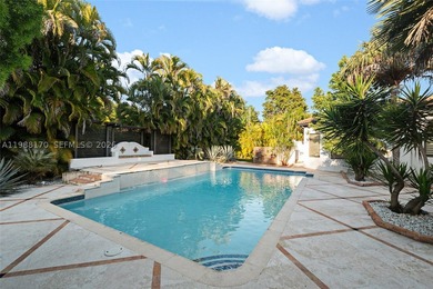 Set on one of Coral Gables finest tree-lined streets, this - photo 9