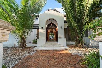 Set on one of Coral Gables finest tree-lined streets, this - photo 10