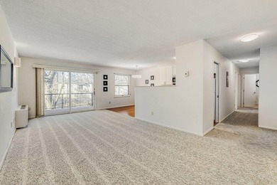 Move right into this top-floor, one-level home offering - photo 2