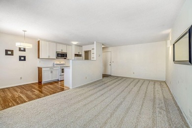 Move right into this top-floor, one-level home offering - photo 3