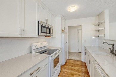 Move right into this top-floor, one-level home offering - photo 5