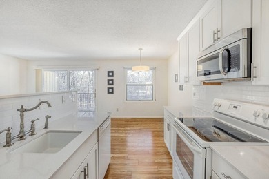 Move right into this top-floor, one-level home offering - photo 6