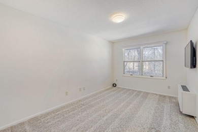 Move right into this top-floor, one-level home offering - photo 9