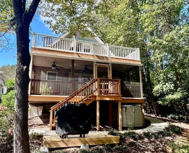 Picture perfect nicely decorated waterfront cottage on Lake - Lake Home For Sale in Mount Gilead, North Carolina