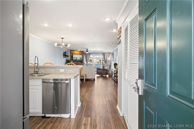 Fully furnished with boat slip & garage. Experience lakefront - photo 3