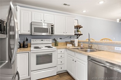 Fully furnished with boat slip & garage. Experience lakefront - photo 4