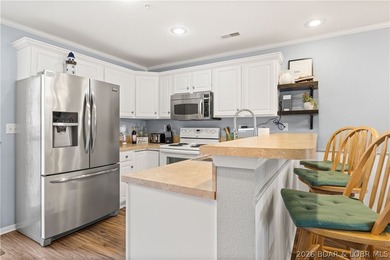 Fully furnished with boat slip & garage. Experience lakefront - photo 5