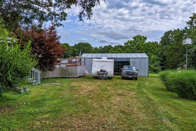 23-acre country property in the Missouri Ozarks featuring a - photo 25