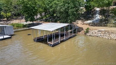 Stunning new-construction waterfront home at the Lake of the - photo 4