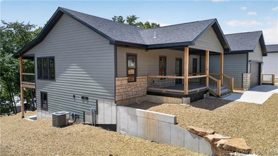 Stunning new-construction waterfront home at the Lake of the - photo 6