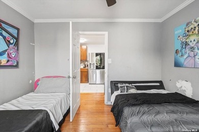 Impeccably maintained brick quadruplex in Jamaica, boasting two - photo 11