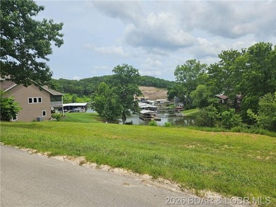 Ready to build on an almost level lot with central water & sewer - photo 1