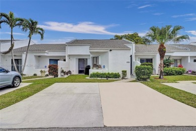 Lake Home For Sale in Royal Palm Beach, Florida