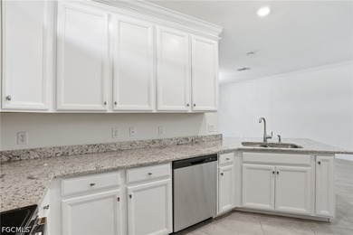 STUNNING LAKE VIEW! Welcome to this BEAUTIFULLY UPDATED villa in - photo 11