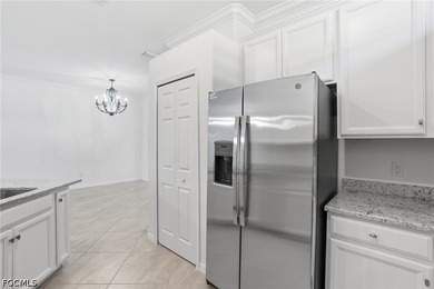 STUNNING LAKE VIEW! Welcome to this BEAUTIFULLY UPDATED villa in - photo 12