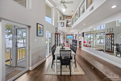 Experience breathtaking waterfront living on Escambia Bay at - photo 13