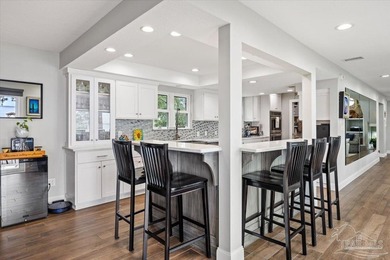 Experience breathtaking waterfront living on Escambia Bay at - photo 14