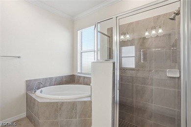 STUNNING LAKE VIEW! Welcome to this BEAUTIFULLY UPDATED villa in - photo 20
