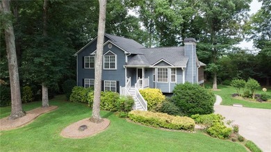 Welcome to #6580 Remington Drive in Cumming, a beautifully - photo 1