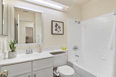 Indulge in the serenity of this beautifully updated top-floor - photo 12