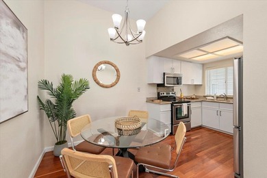 Indulge in the serenity of this beautifully updated top-floor - photo 13