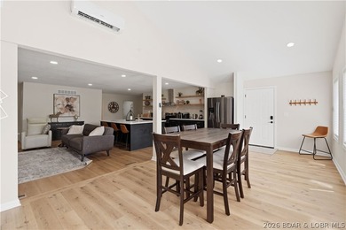 Lakefront living on 2 private acres at the 8MM near Laurie! - photo 5