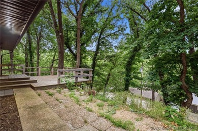 Experience the charm of lakeside living in this beautifully - photo 8