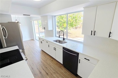 From the light fixtures to the flooring, this home has been - photo 14