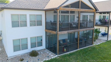 Lake view living with a boat slip at The Villas at Tuscany! This - photo 2