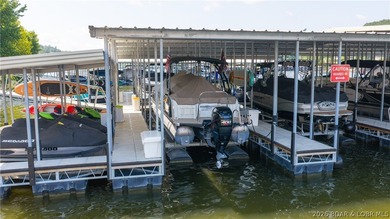 Lake view living with a boat slip at The Villas at Tuscany! This - photo 3