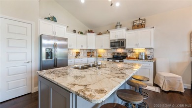 Lake view living with a boat slip at The Villas at Tuscany! This - photo 4