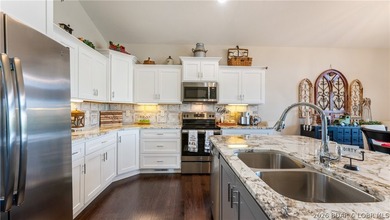 Lake view living with a boat slip at The Villas at Tuscany! This - photo 5