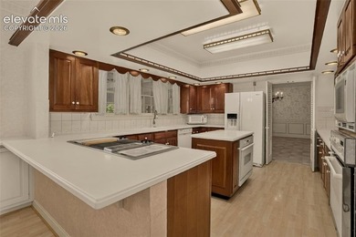 Lovingly preserved and timeless 1954 brick Colonial ranch on a - photo 17