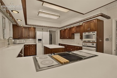 Lovingly preserved and timeless 1954 brick Colonial ranch on a - photo 18