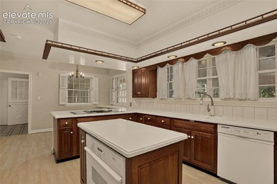 Lovingly preserved and timeless 1954 brick Colonial ranch on a - photo 19