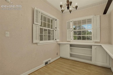 Lovingly preserved and timeless 1954 brick Colonial ranch on a - photo 20