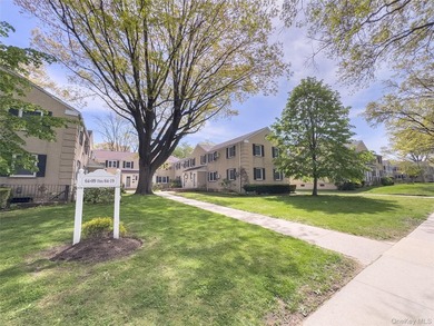 Tucked within the quiet, tree-lined Estates at Bayside, this - photo 1
