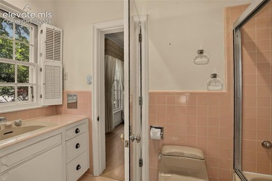 Lovingly preserved and timeless 1954 brick Colonial ranch on a - photo 27