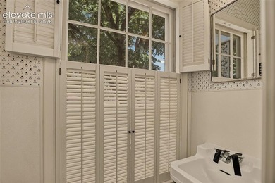 Lovingly preserved and timeless 1954 brick Colonial ranch on a - photo 37