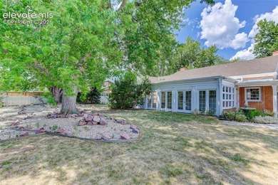 Lovingly preserved and timeless 1954 brick Colonial ranch on a - photo 45