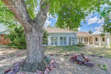Lovingly preserved and timeless 1954 brick Colonial ranch on a - photo 46