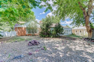 Lovingly preserved and timeless 1954 brick Colonial ranch on a - photo 47