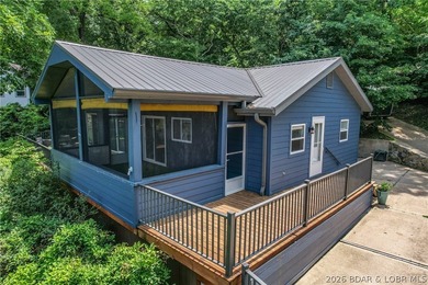 Beautifully updated lakefront home with a private dock, workshop - photo 1
