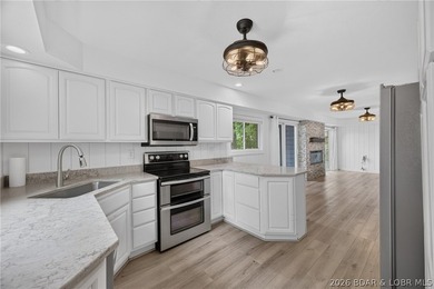 Beautifully updated lakefront home with a private dock, workshop - photo 10