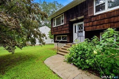 Desirable lake community, a classic raised ranch with loads of - photo 1