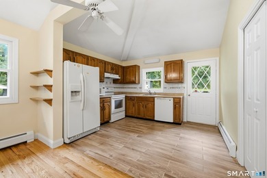 Desirable lake community, a classic raised ranch with loads of - photo 3